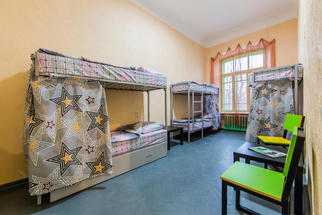 Postel nebo postele na pokoji v ubytování Vorobey Hostel