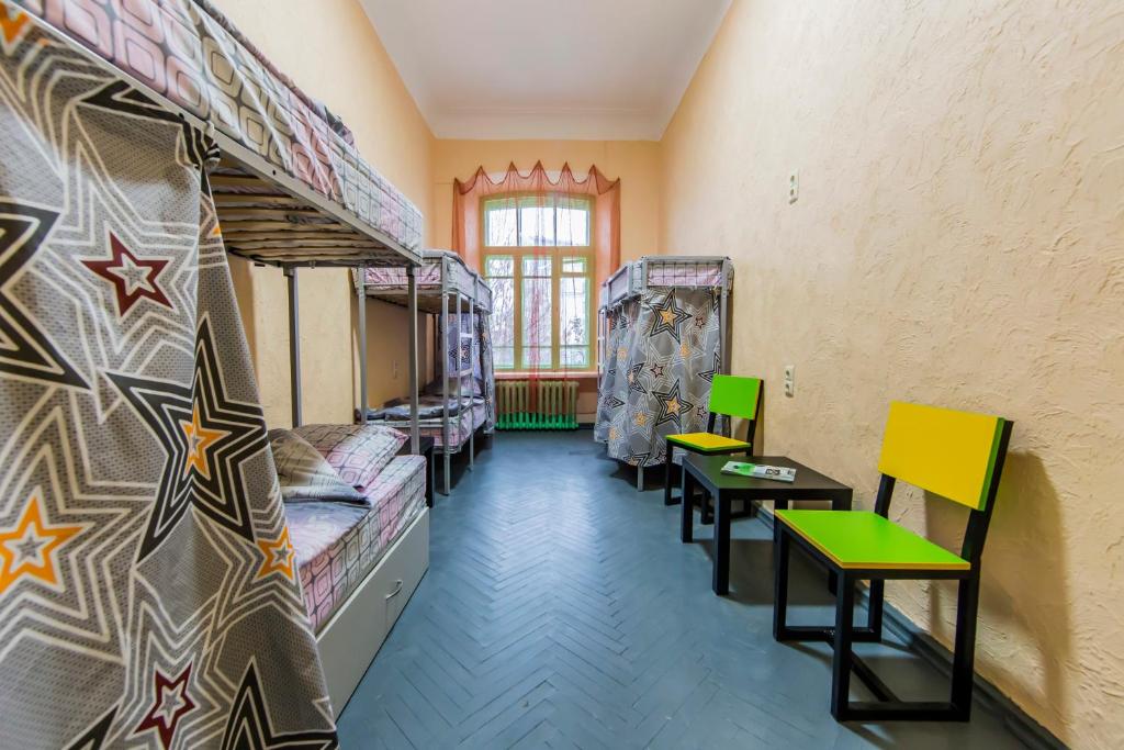 Postel nebo postele na pokoji v ubytování Vorobey Hostel
