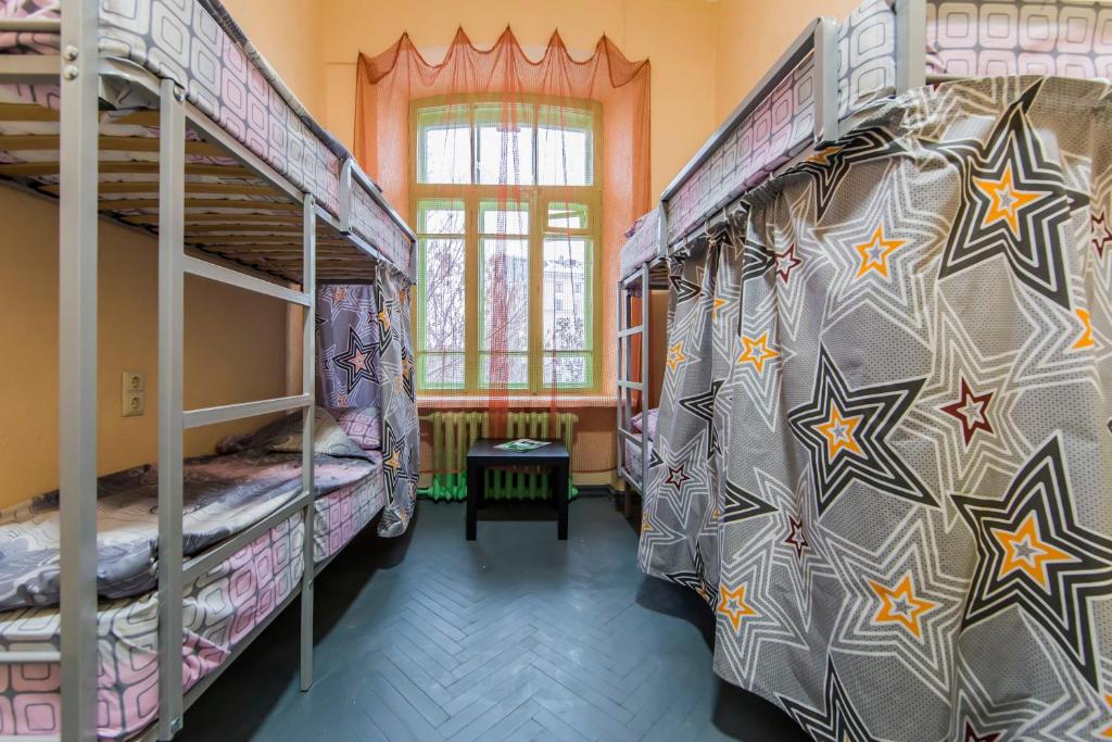 Postel nebo postele na pokoji v ubytování Vorobey Hostel