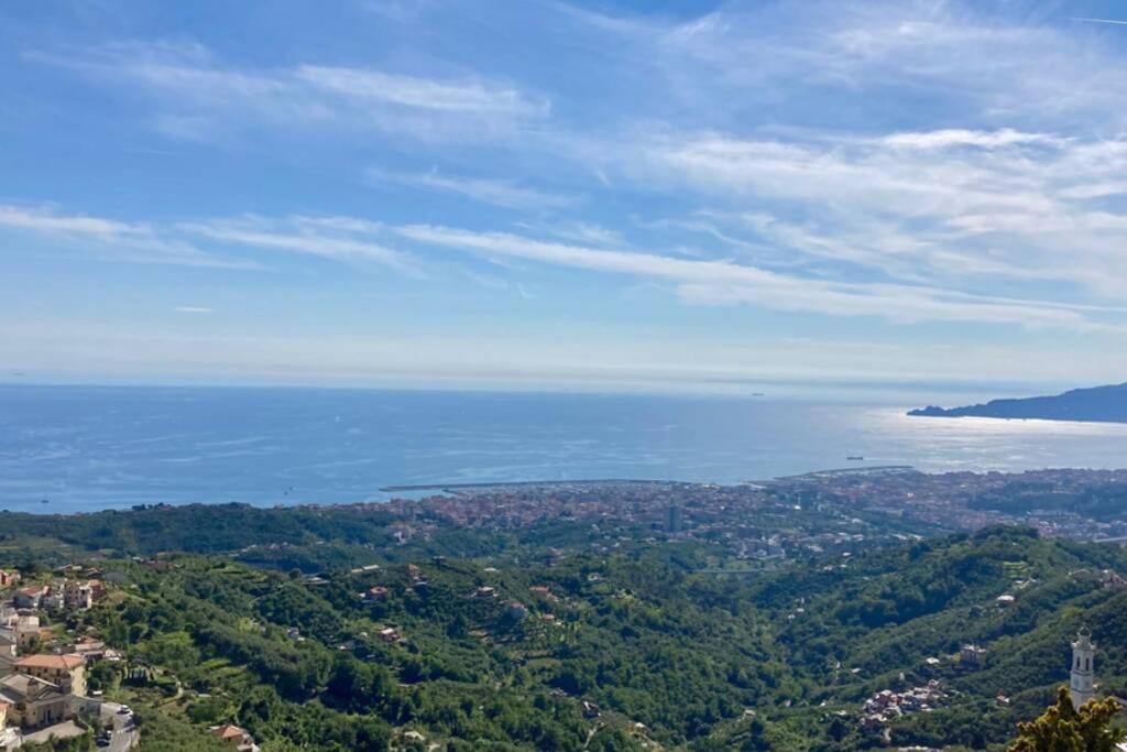 an aerial view of the ocean and a city at LA FINESTRA SUL GOLFO - CITRA 010018-LT-0033 - in Cogorno