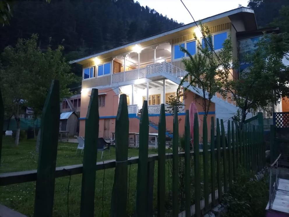 a house with a fence in front of it at Neelum Good View in Shardi