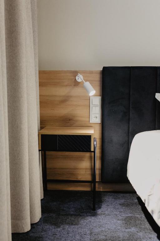 Posteľ alebo postele v izbe v ubytovaní Molto Bene Hotel & Restaurant