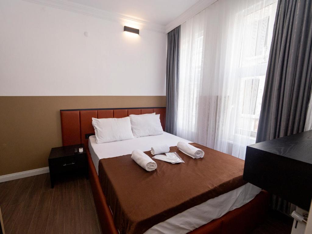 Postel nebo postele na pokoji v ubytování Miss Suite