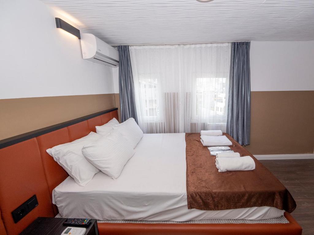 Postel nebo postele na pokoji v ubytování Miss Suite
