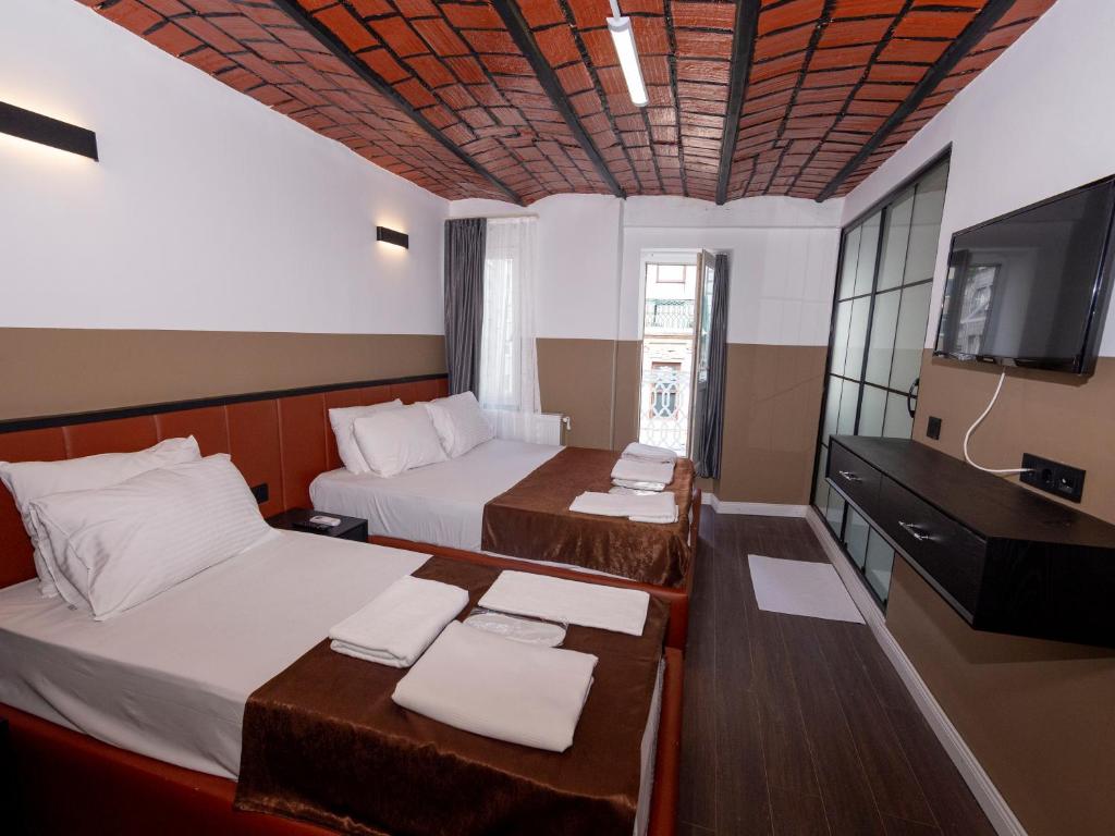 Postel nebo postele na pokoji v ubytování Miss Suite