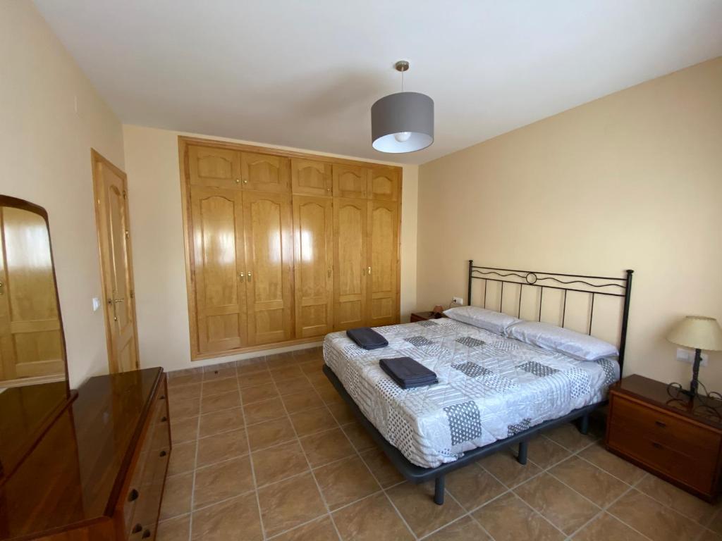 Postel nebo postele na pokoji v ubytování El Rincón de Dorotea - Casa rural