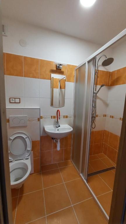 Koupelna v ubytování Penzion U Statku