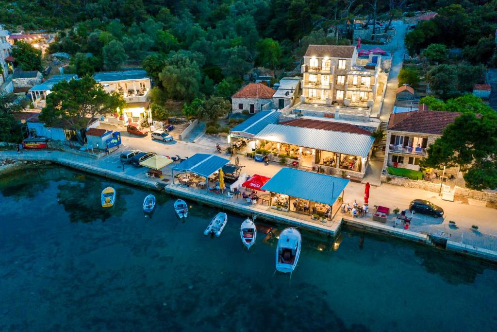 an aerial view of a marina with boats in the water at Corallium Precious in Pomena