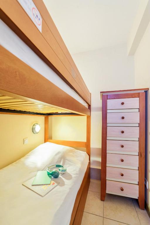 Postel nebo postele na pokoji v ubytování SOWELL HOTELS Ardèche