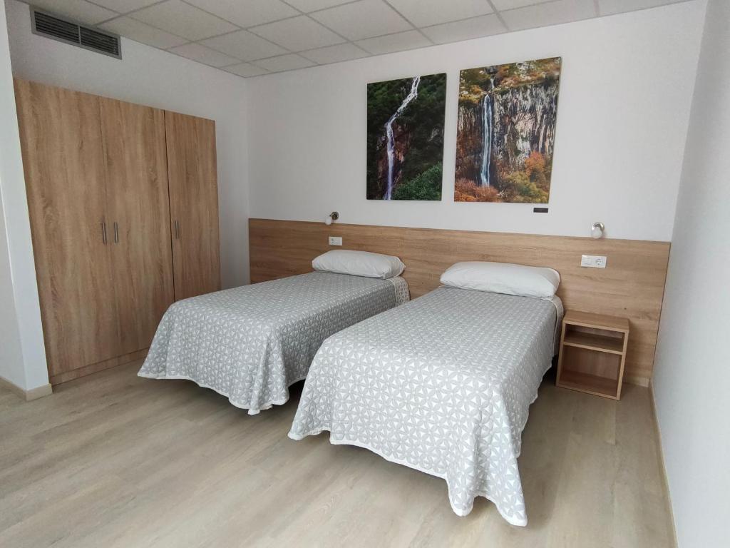 Postel nebo postele na pokoji v ubytování Las Huertas