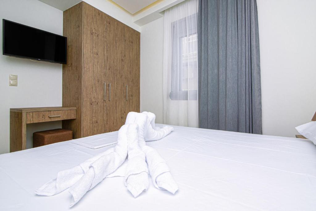 Postel nebo postele na pokoji v ubytování Amara Residences by Estia