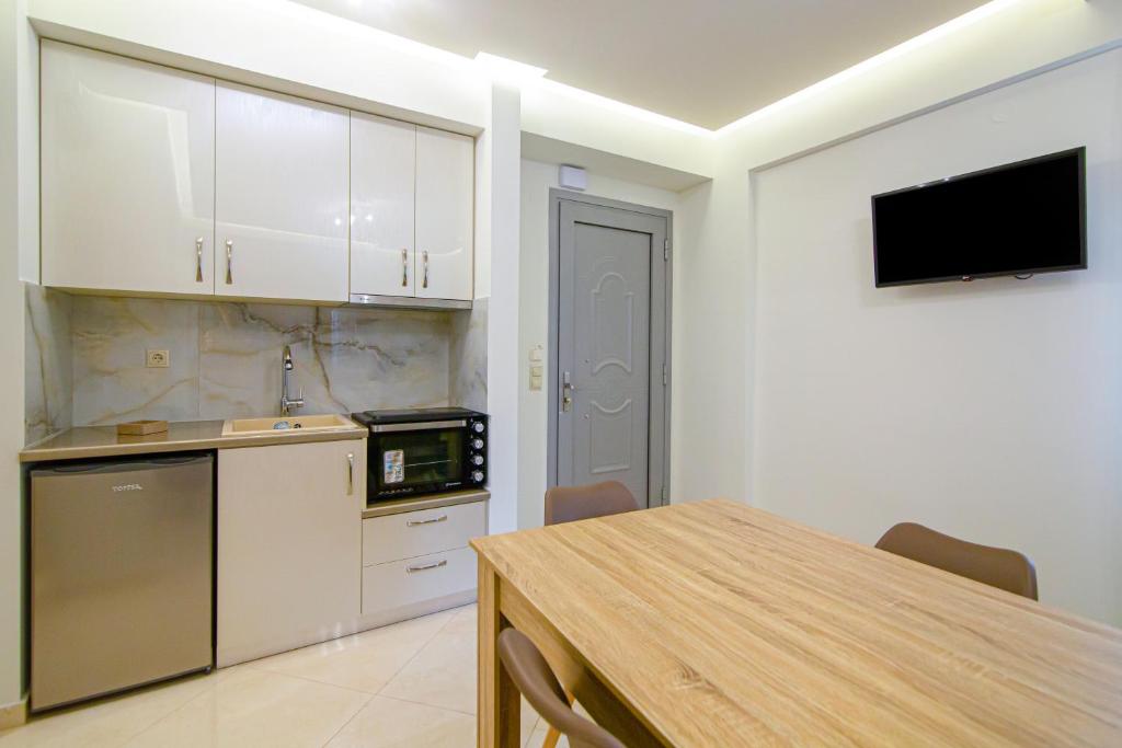 Kuchyň nebo kuchyňský kout v ubytování Amara Residences by Estia