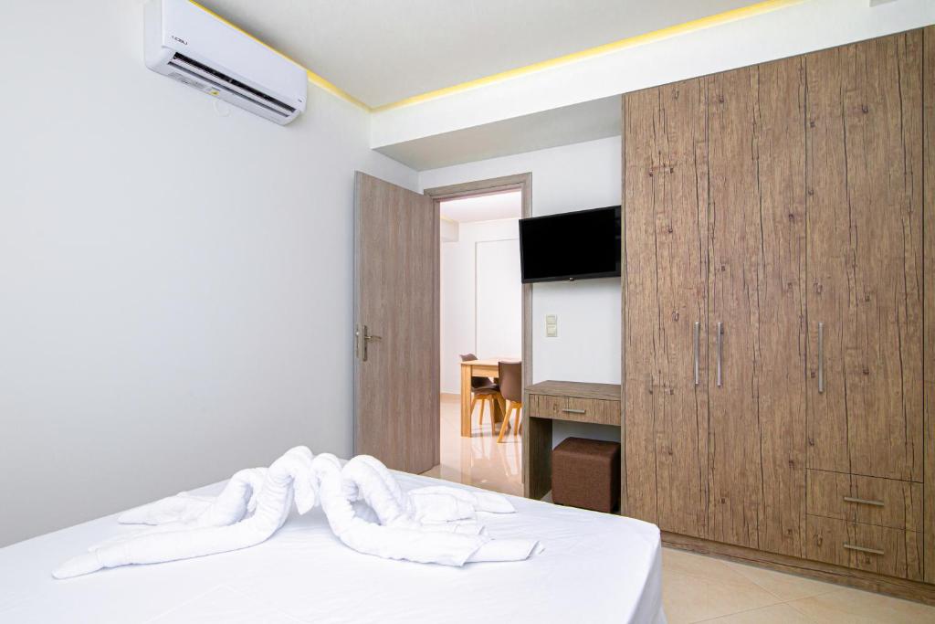 TV a/nebo společenská místnost v ubytování Amara Residences by Estia