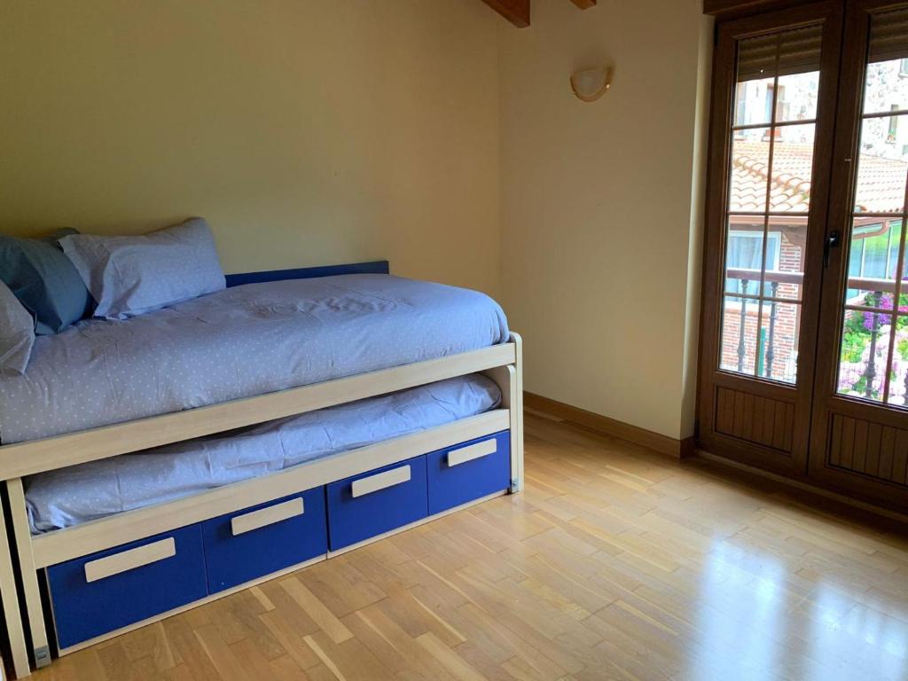 מיטה או מיטות בחדר ב-Chalet Individual en Vargas, Cantabria