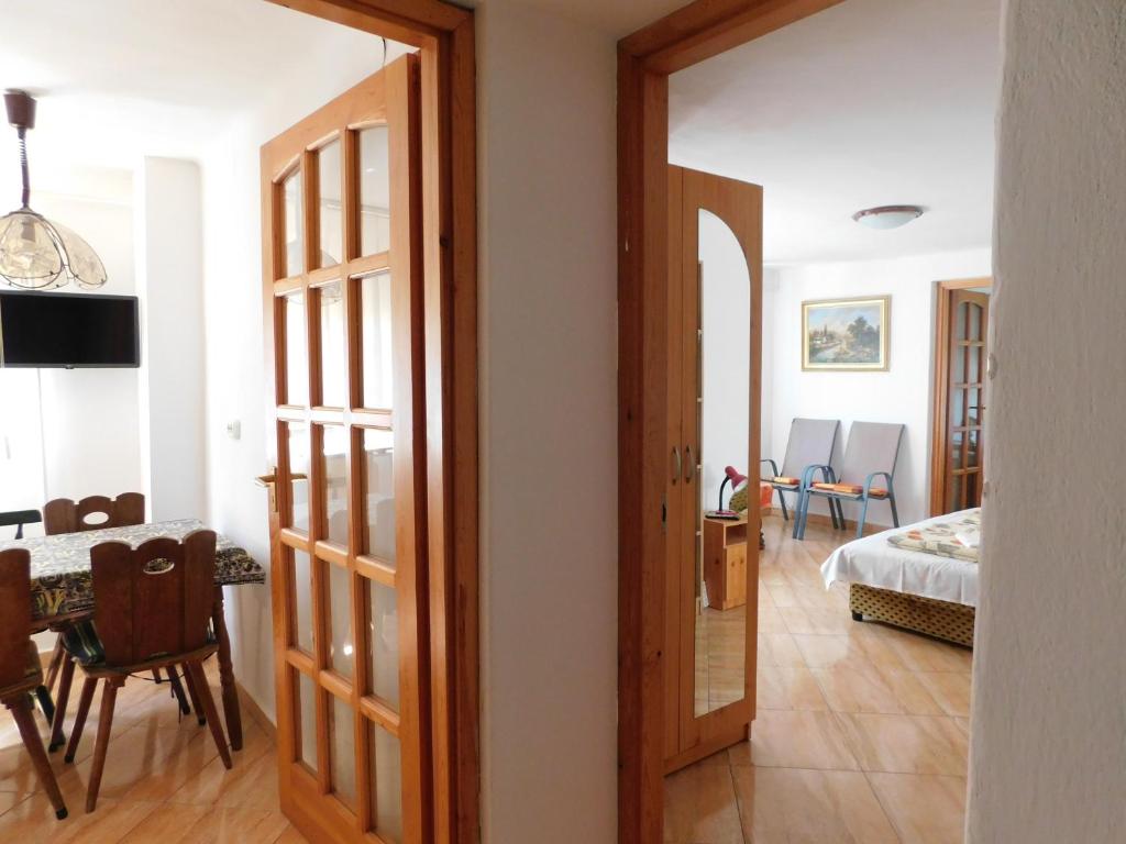 Postel nebo postele na pokoji v ubytování Szamóca Vendégház