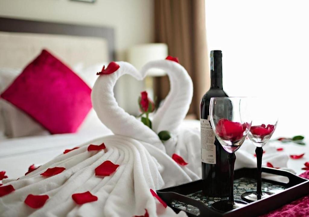 Postel nebo postele na pokoji v ubytování Hotel Royal II