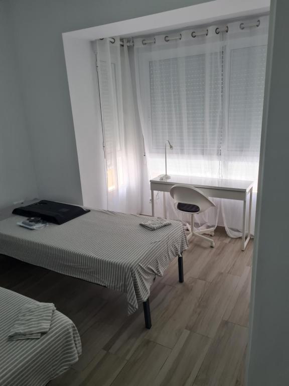 Ένα ή περισσότερα κρεβάτια σε δωμάτιο στο Mini apartament