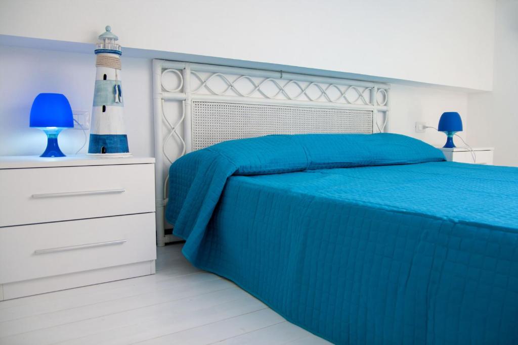 A bed or beds in a room at Villa Amateia