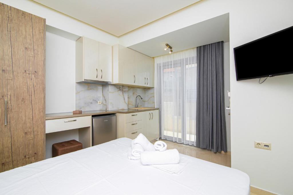 Postel nebo postele na pokoji v ubytování Amara Residences by Estia