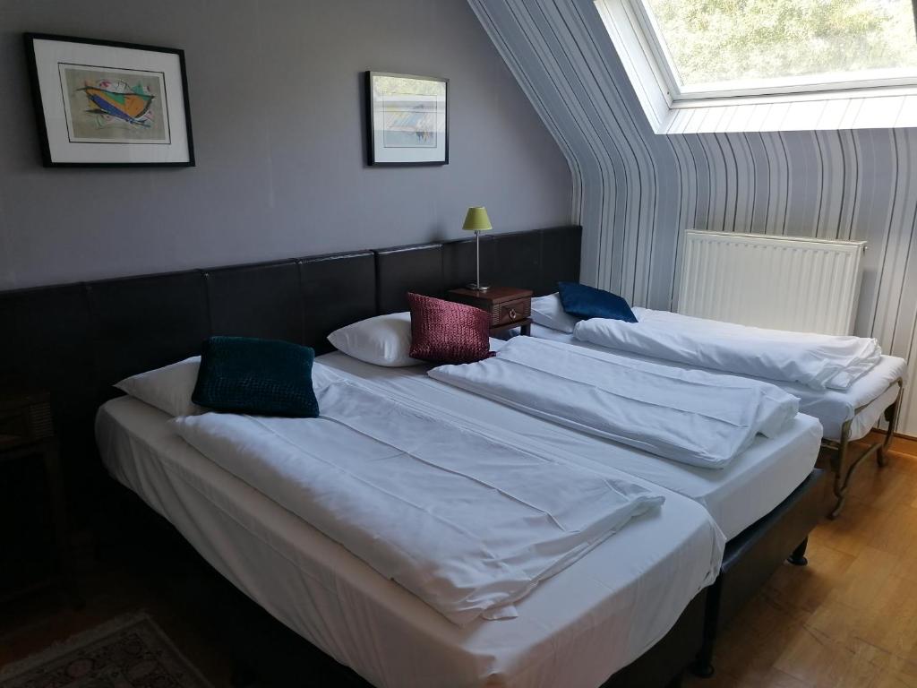 Postel nebo postele na pokoji v ubytování Hotel Prins van Oranje
