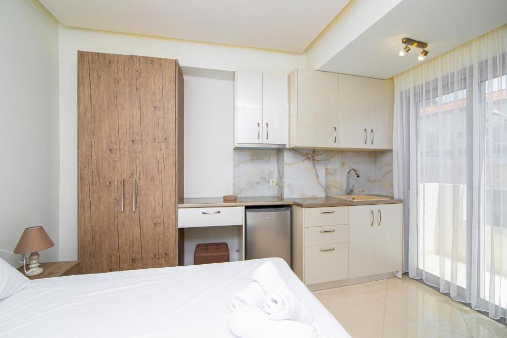Kuchyň nebo kuchyňský kout v ubytování Amara Residences by Estia