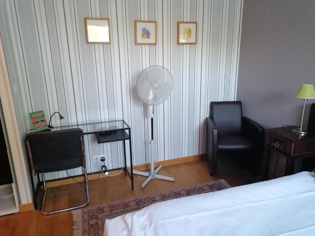 Postel nebo postele na pokoji v ubytování Hotel Prins van Oranje