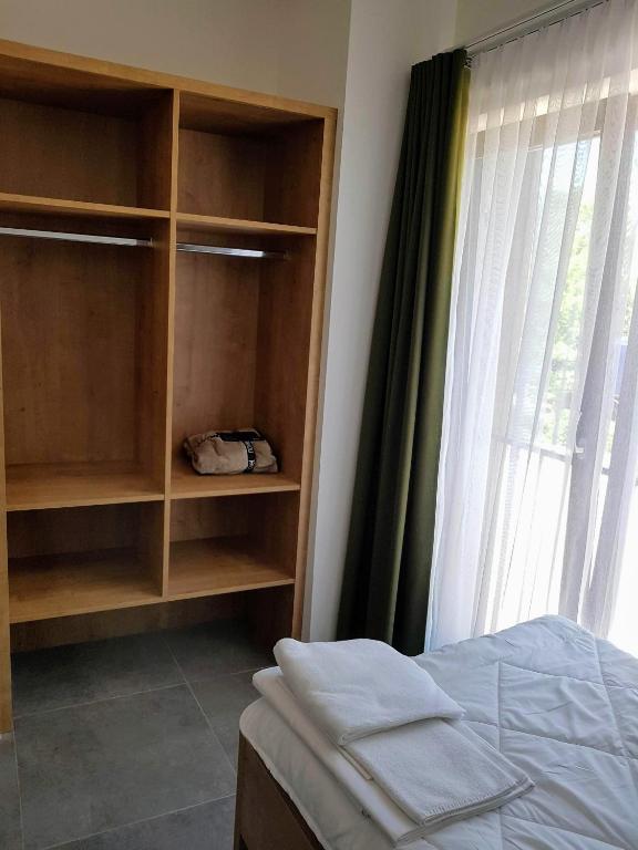 Postel nebo postele na pokoji v ubytování Apartmány Jura
