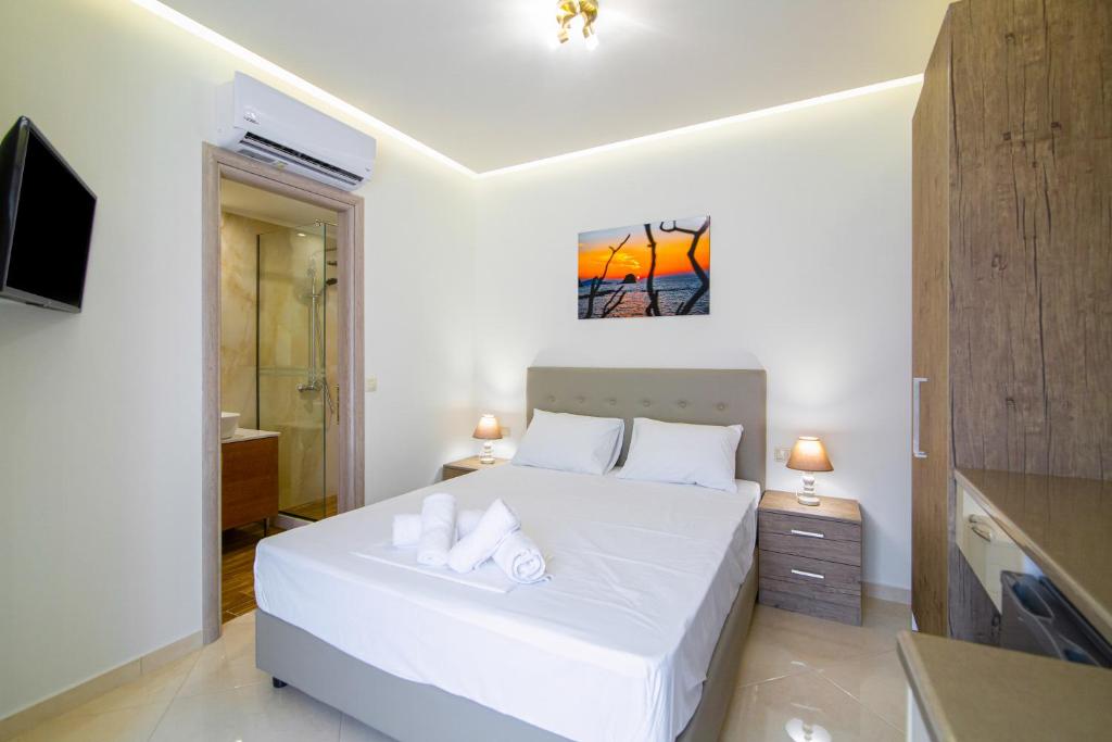 Postel nebo postele na pokoji v ubytování Amara Residences by Estia