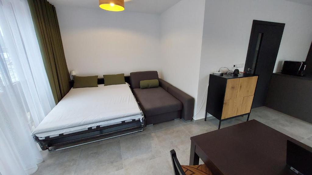 Postel nebo postele na pokoji v ubytování Apartmány Jura