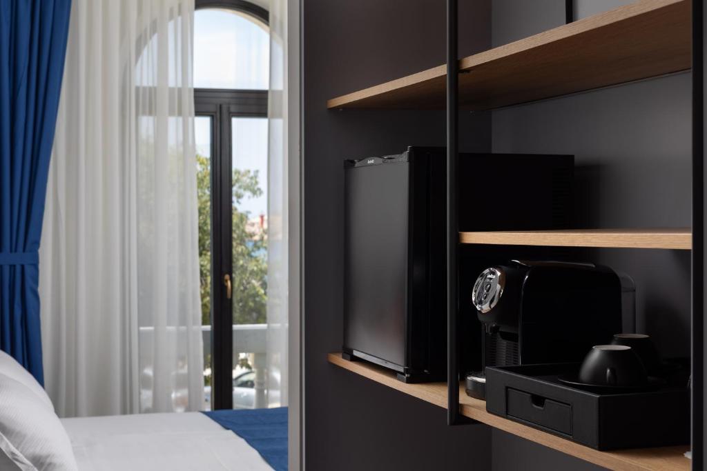 Postel nebo postele na pokoji v ubytování Heritage Hotel Porin Makarska