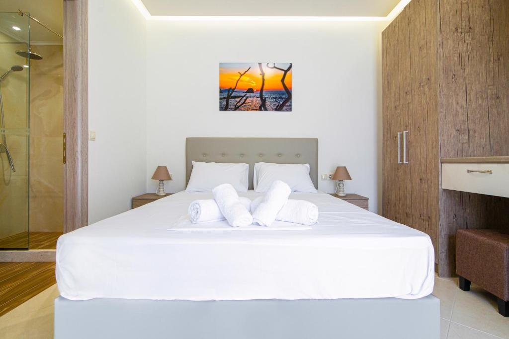 Postel nebo postele na pokoji v ubytování Amara Residences by Estia