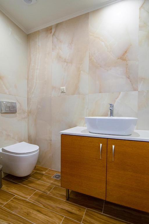 Koupelna v ubytování Amara Residences by Estia