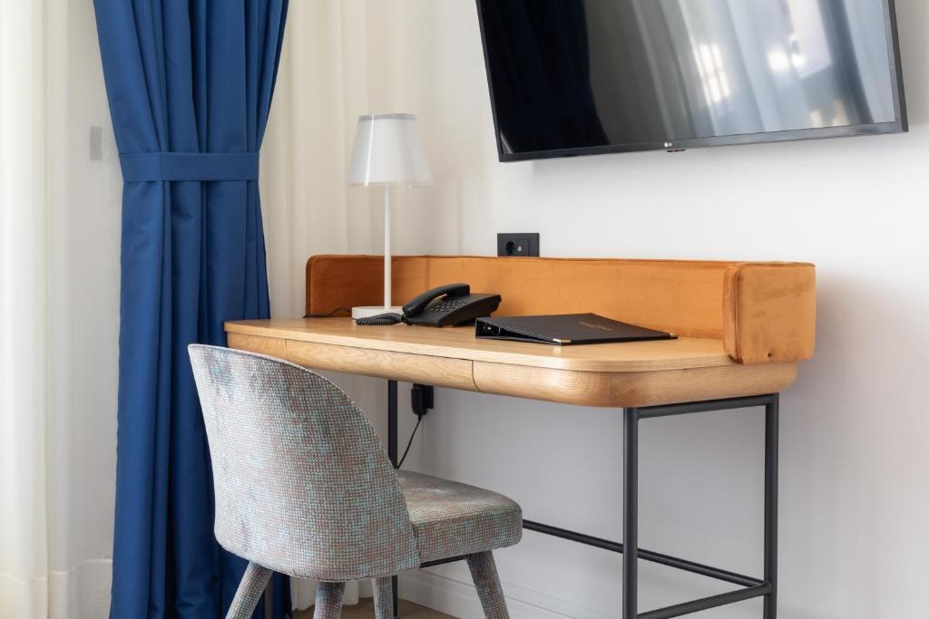 TV a/nebo společenská místnost v ubytování Heritage Hotel Porin Makarska
