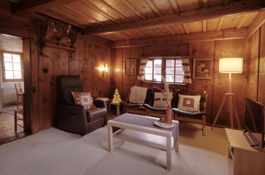 Posezení v ubytování Charmant appartement avec cachet de l'ancien