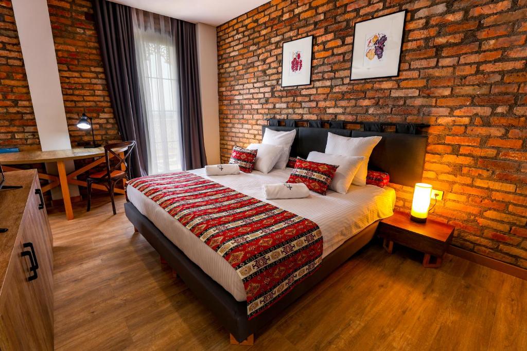 Postel nebo postele na pokoji v ubytování Chateau Artwine