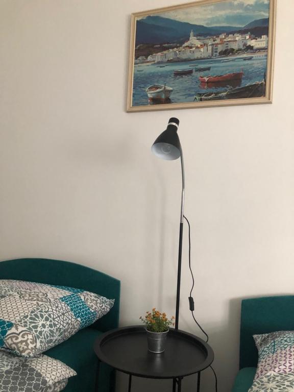 Postel nebo postele na pokoji v ubytování Kelemen Apartman Nagykanizsa