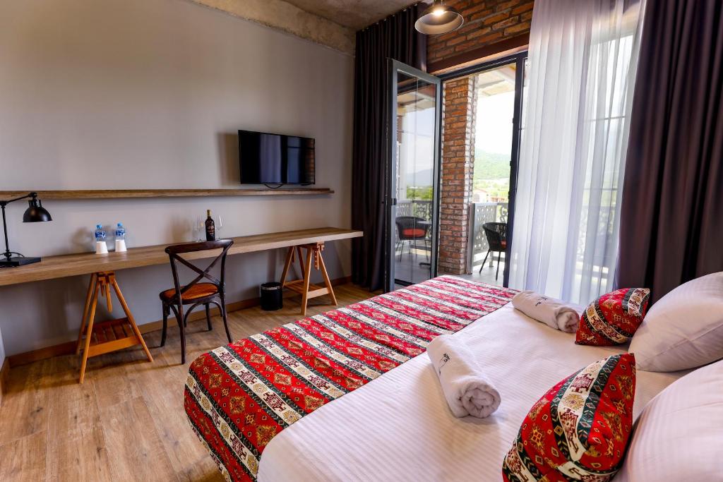 Postel nebo postele na pokoji v ubytování Chateau Artwine