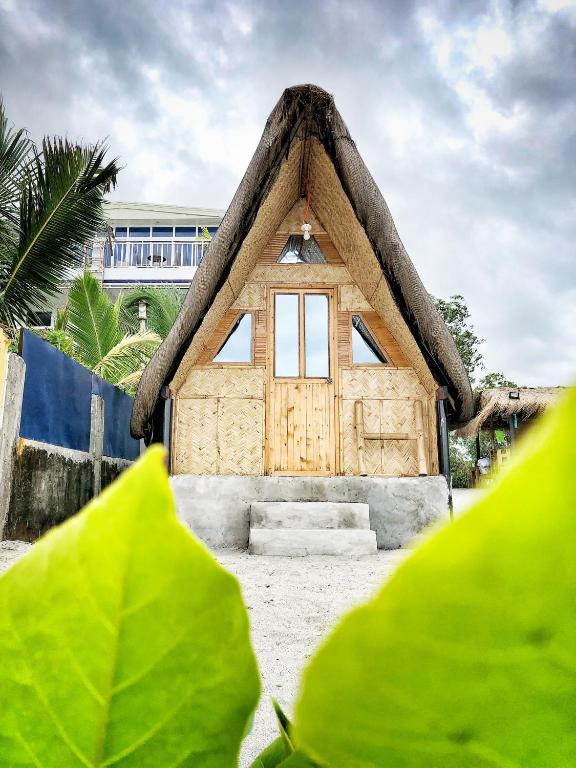 Zahrada ubytování Beach Front Hut - Faith Bay Huts 1