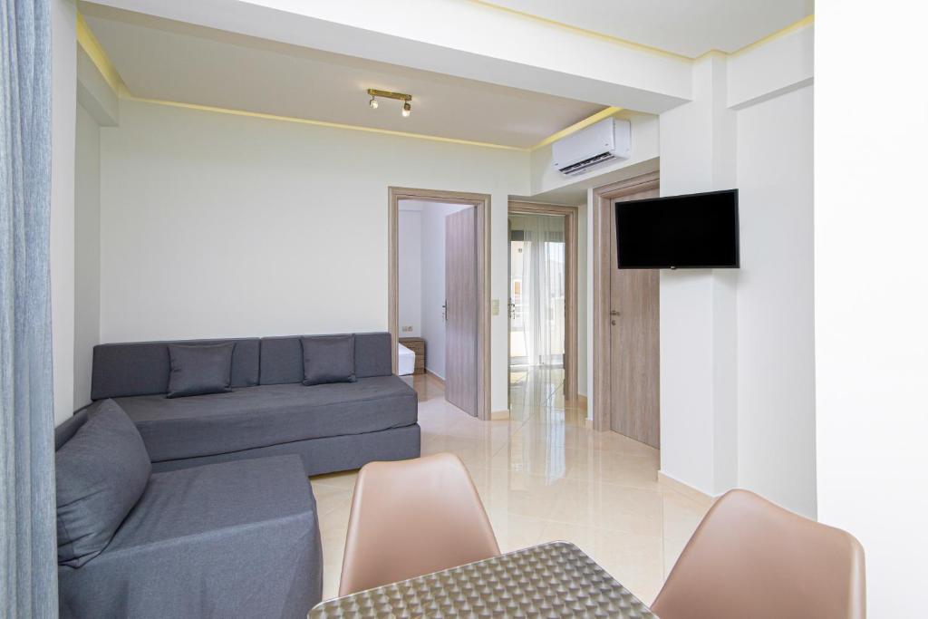 TV a/nebo společenská místnost v ubytování Amara Residences by Estia