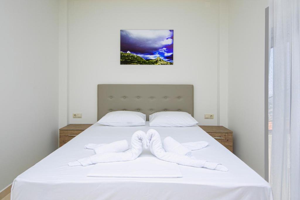 Postel nebo postele na pokoji v ubytování Amara Residences by Estia