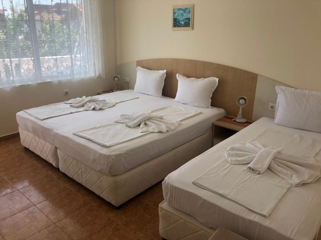 Postel nebo postele na pokoji v ubytování Borko Guest House