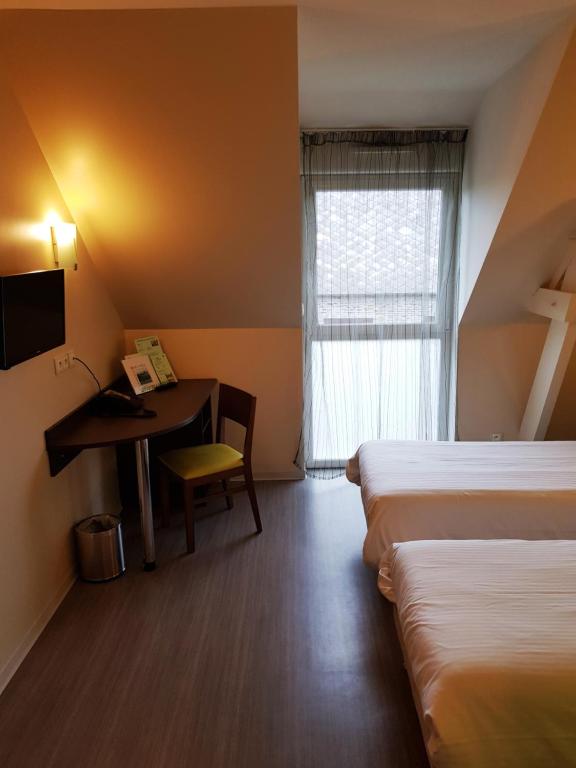 Katil atau katil-katil dalam bilik di Auberge de la Baie