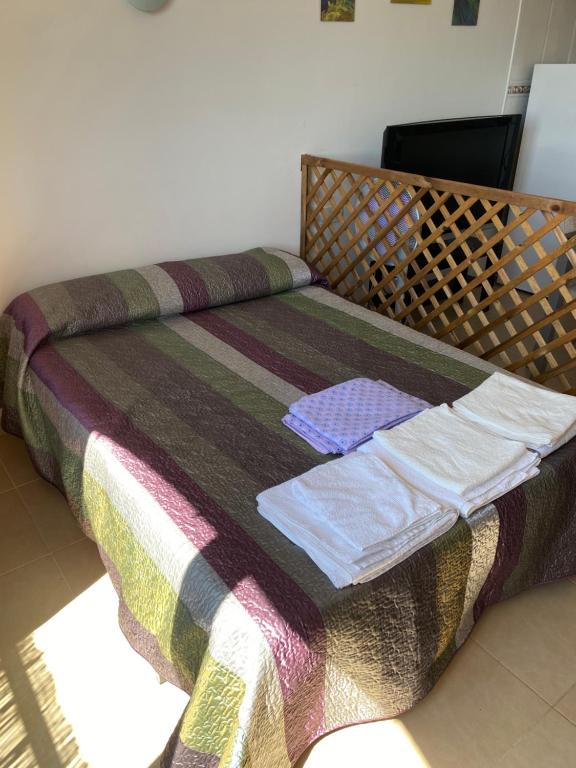 Posteľ alebo postele v izbe v ubytovaní Apartamento En Miami Platja