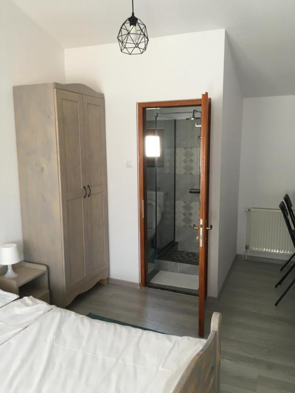 Postel nebo postele na pokoji v ubytování Casa Katona