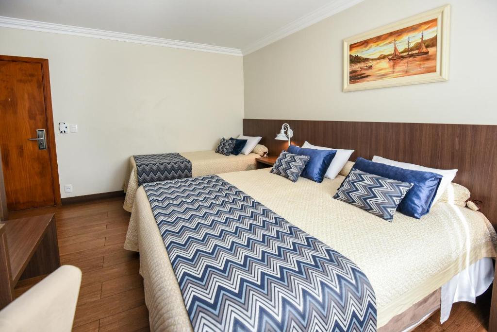 Postel nebo postele na pokoji v ubytování Hotel Kehl Haus