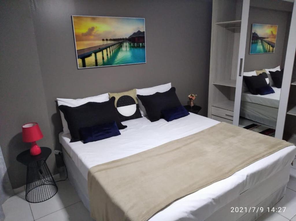 Ένα ή περισσότερα κρεβάτια σε δωμάτιο στο Estudio no West Flat Mossoró - Alto Padrão