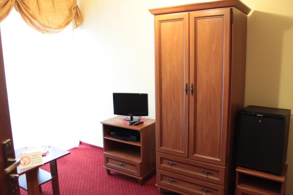 TV a/nebo společenská místnost v ubytování Zajazd Skorpion B&B