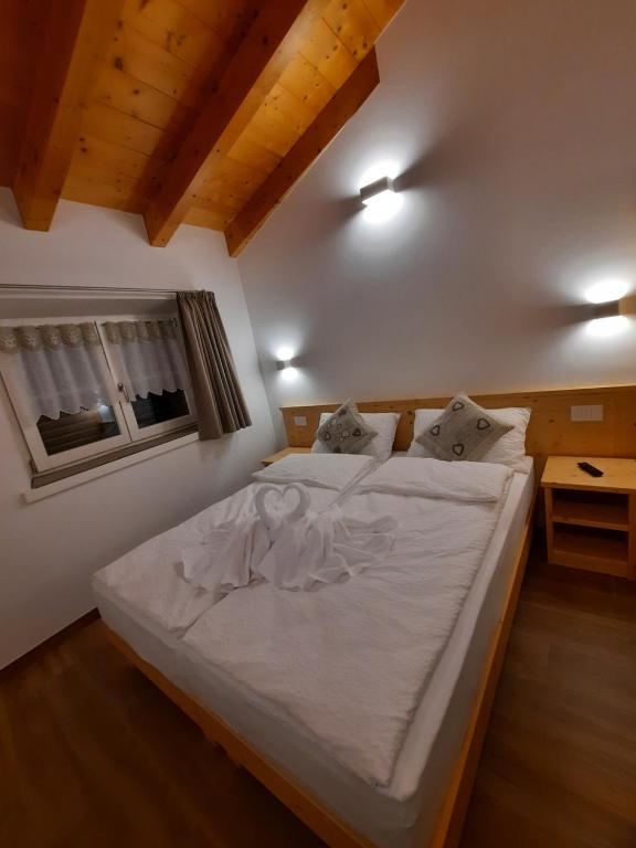 Posteľ alebo postele v izbe v ubytovaní B&B alla Spiazzőla