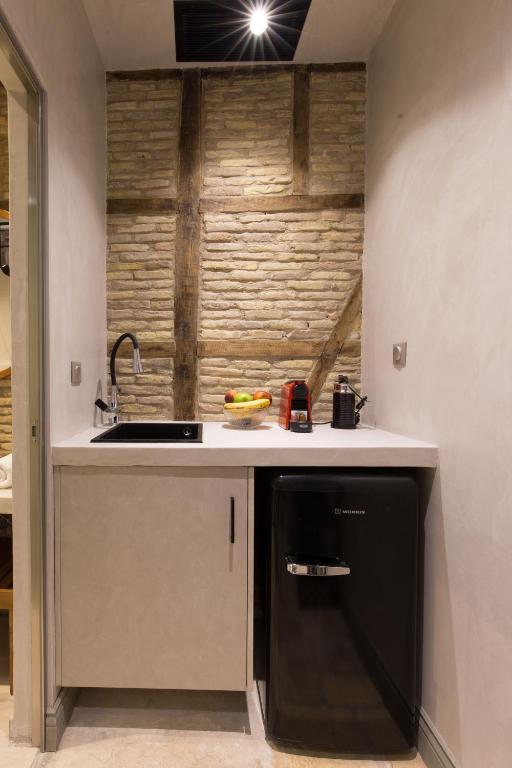 Kuchyňa alebo kuchynka v ubytovaní Libretto Suites