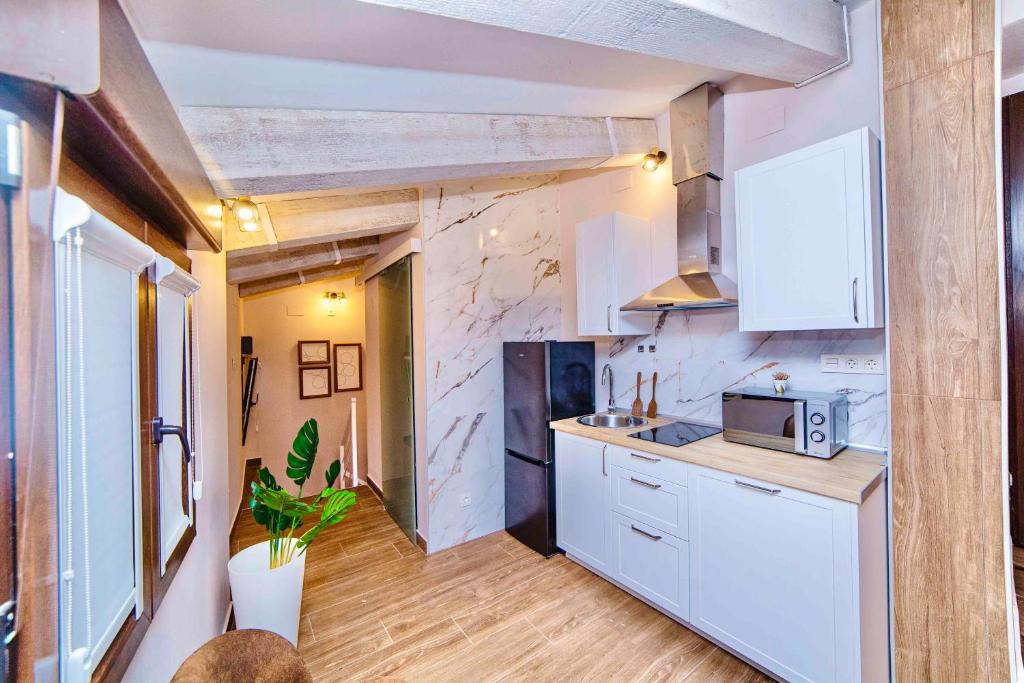 Kuchyň nebo kuchyňský kout v ubytování Casa Rural Las Colmenas